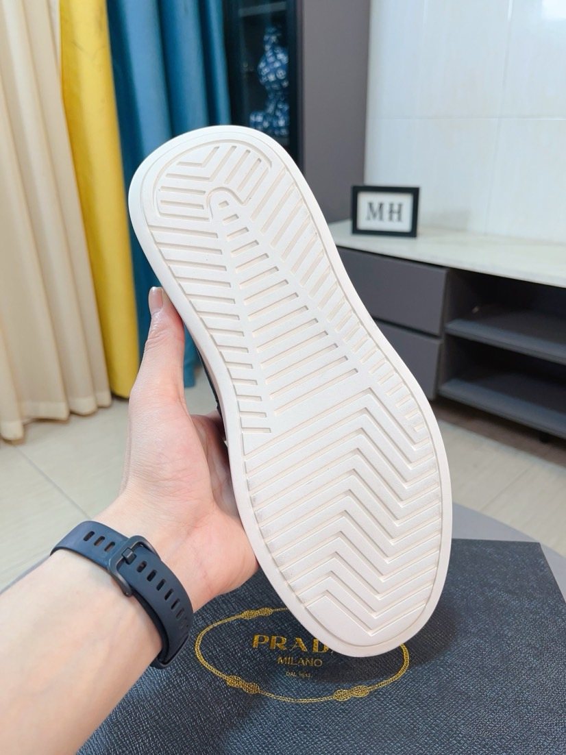 Prada Textured Slip-On Shoes